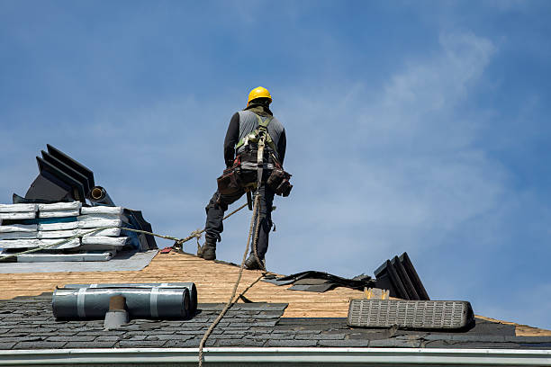 Professional Roofing technician working in Monroe, OR